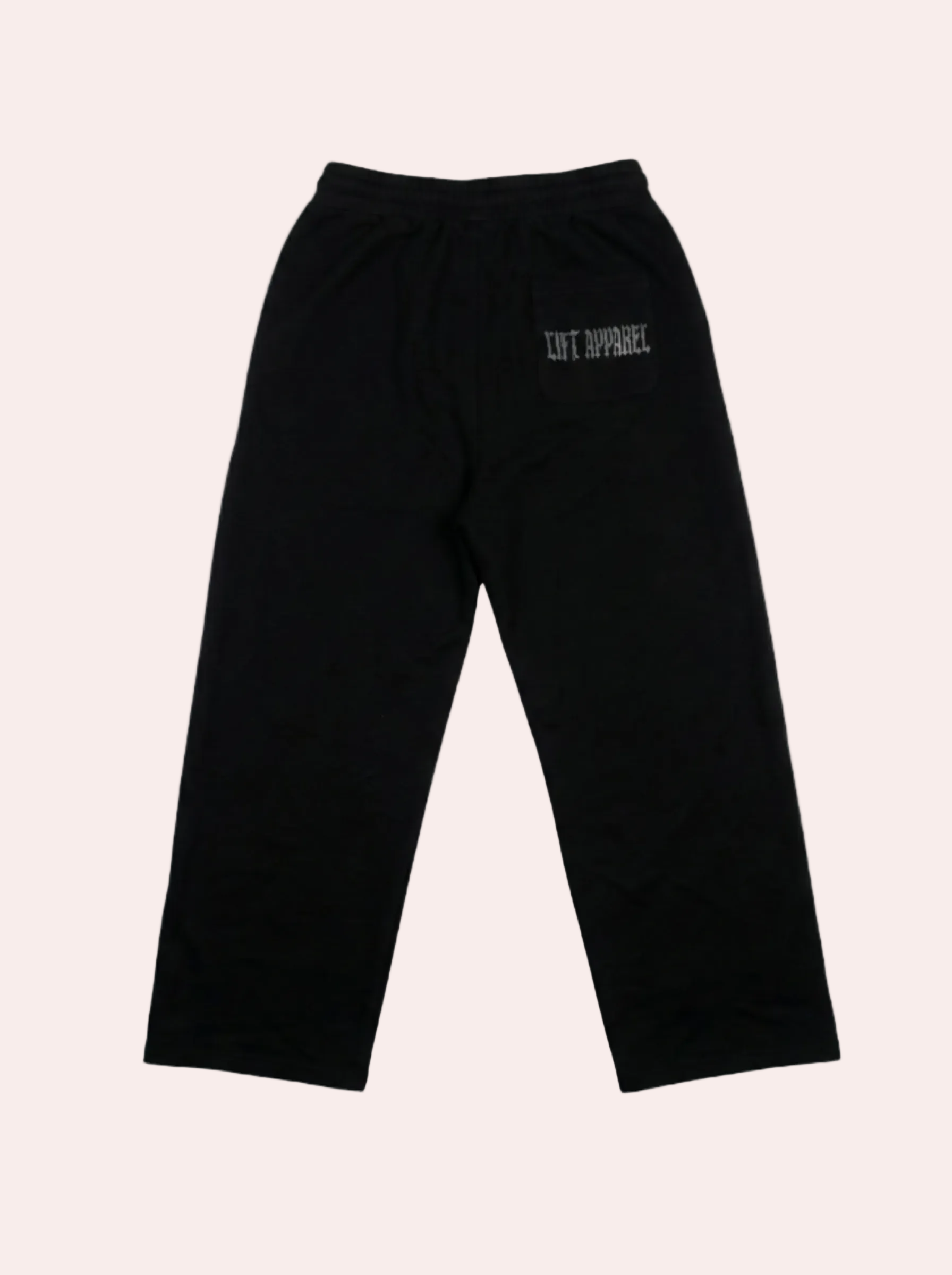 Black sweatpants with a logo on a gray background