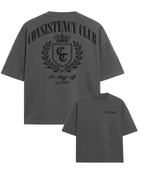 Gray t-shirt with 'Consistency Club' logo and text on a white background