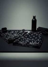 Black bandanas with 'Lift Apparel' branding on a dark surface.