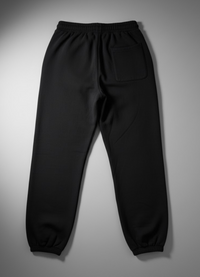 Black pants on a gray background