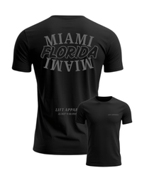 Black t-shirt with 'MIAMI FLORIDA MIAMI' text on the back, displayed from front and back views.