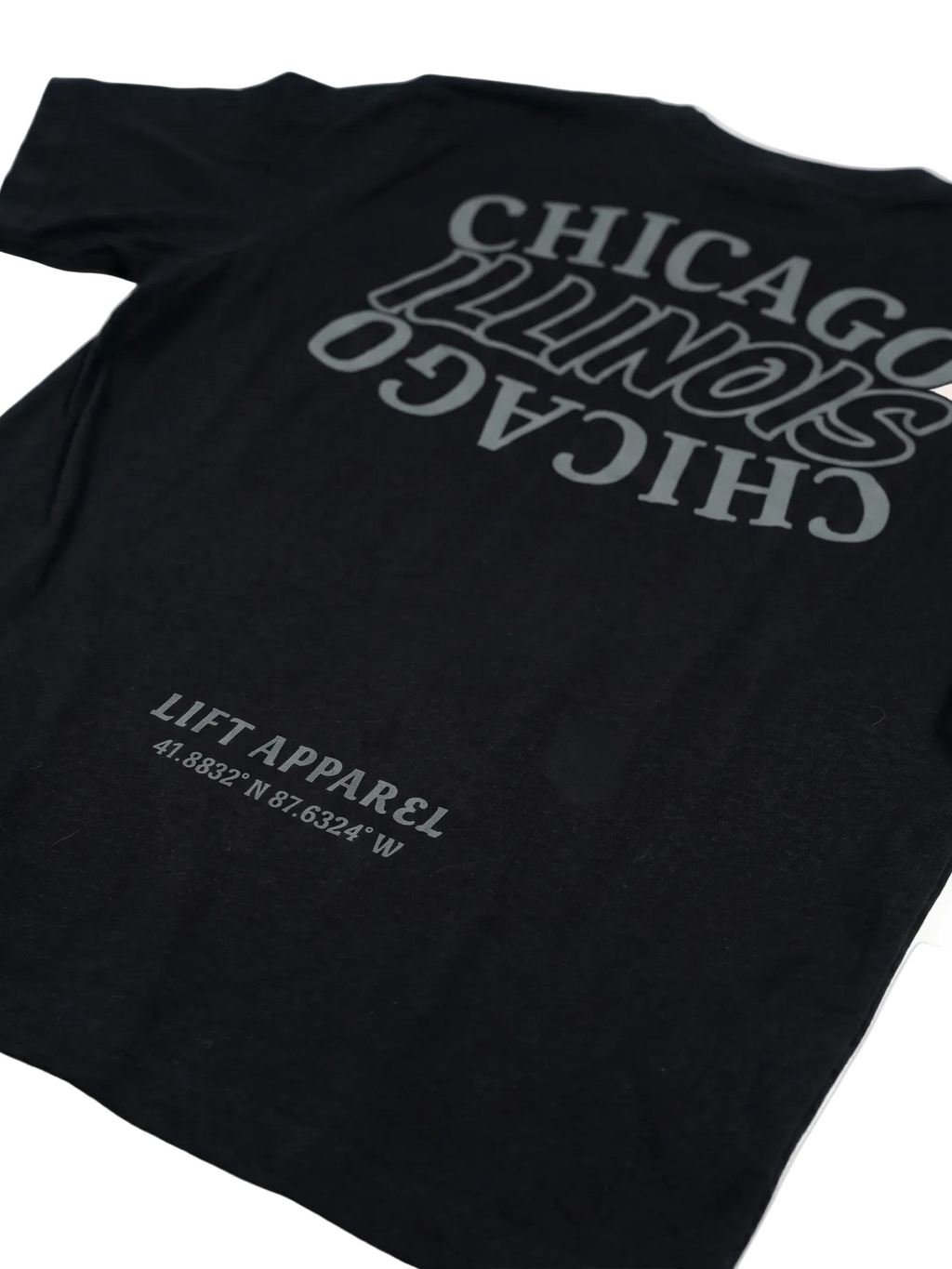 Black t-shirt with 'Chicago Illinois' text and coordinates on a white background