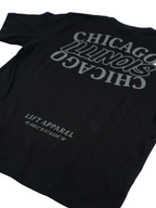 Black t-shirt with 'Chicago Illinois' text and coordinates on a white background