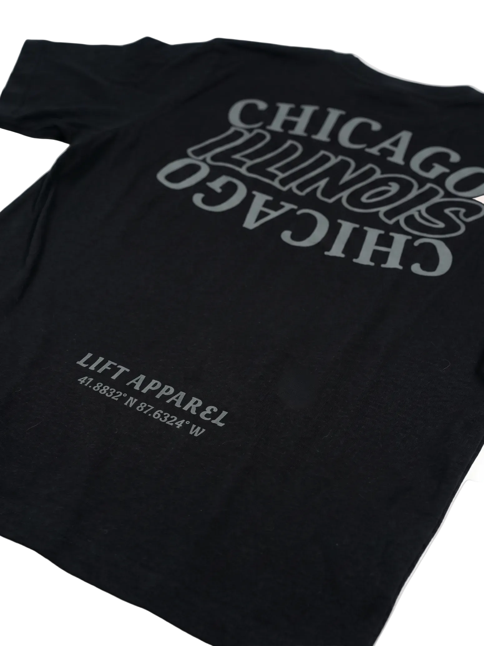 Black t-shirt with 'Chicago Illinois' text and coordinates on a white background