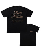 Black Pressure oversized gym tee, front and back with gold Built Under Pressure print, flat lay