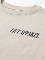 Beige sweatshirt with 'LIFT APPAREL' text on a white background