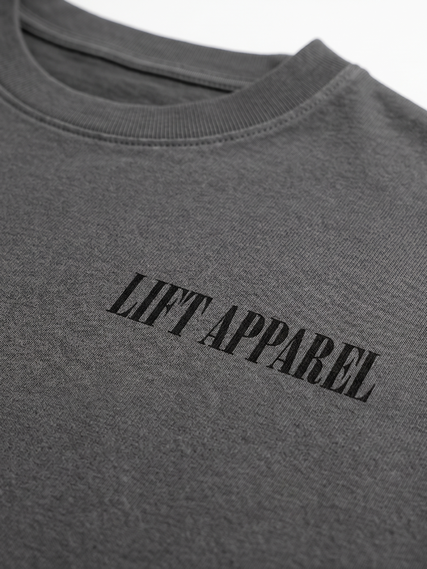 Gray sweatshirt with 'LIFT APPAREL' text on a white background