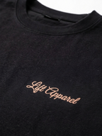 Black t-shirt with 'Lift Apparel' embroidery on a white background
