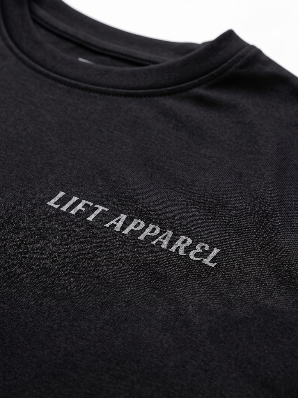 Black garment with 'LIFT APPAREL' logo on a white background