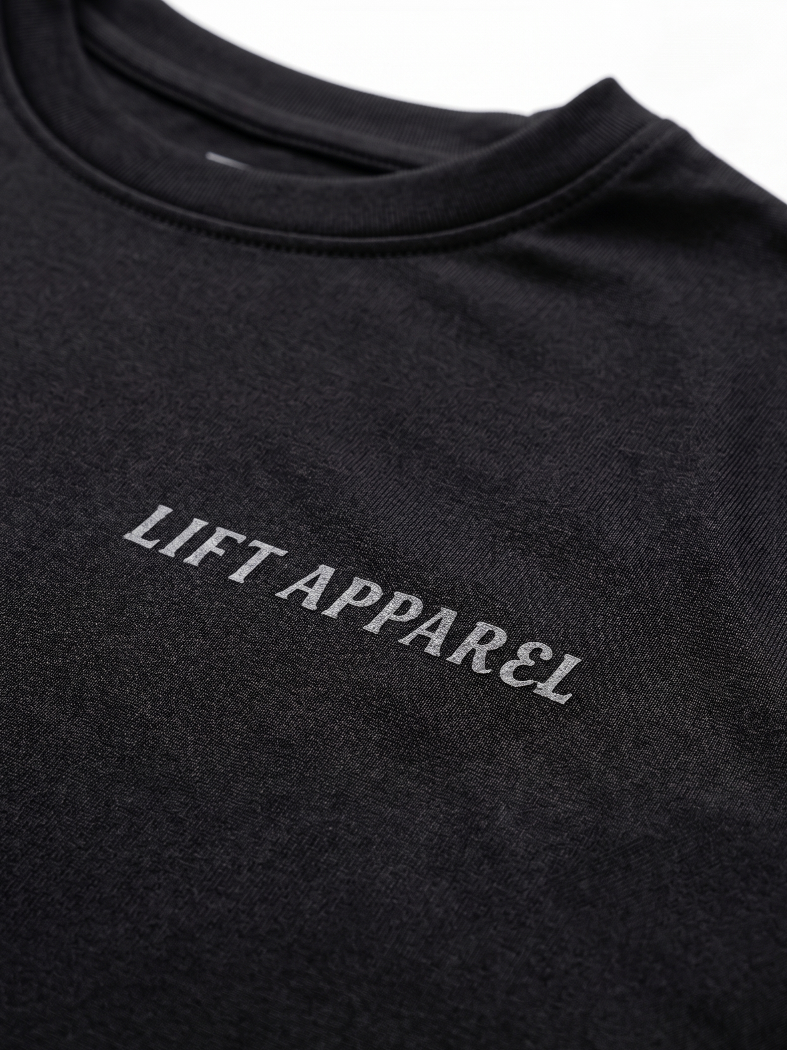 Black garment with 'LIFT APPAREL' logo on a white background